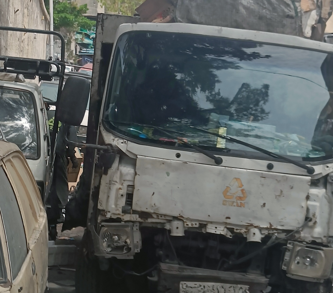 Waste collection vehicle on the streets of Damascus
